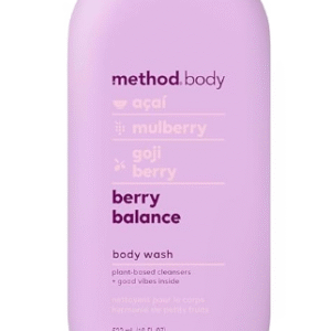 A bottle of Method Berry Balance body wash with fresh berries, highlighting its natural, skin-friendly formula.