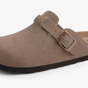 A stylish pair of ODOLY's genuine suede clogs in a neutral color, shown from the side on a wooden background.
