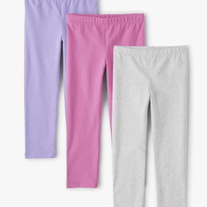 Toddler girl playing happily in a pair of soft, solid-color leggings from The Children's Place multipack.