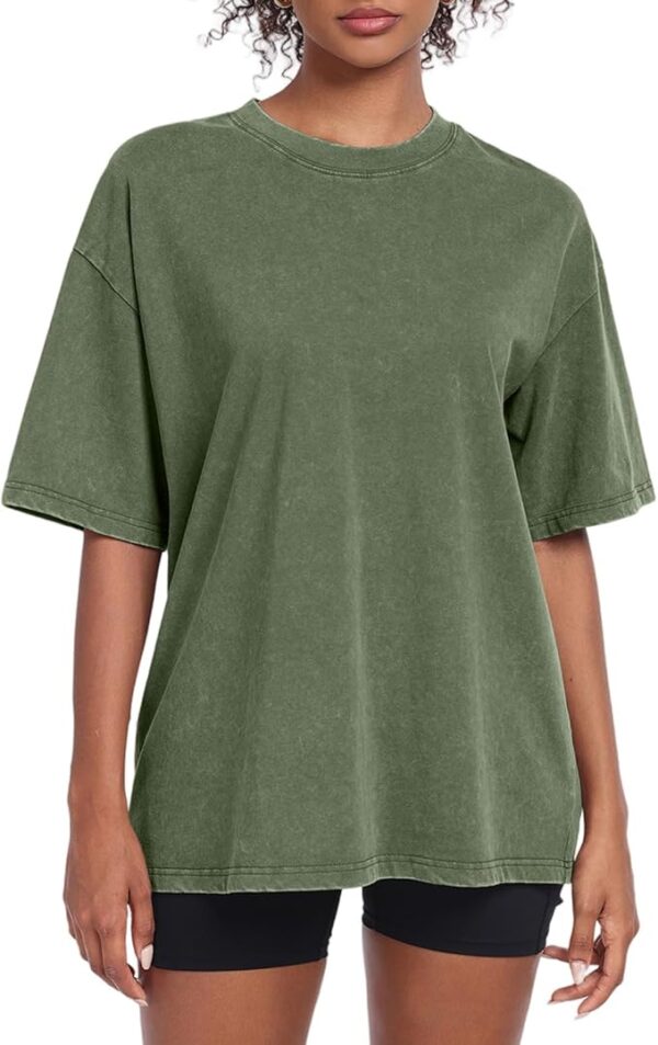 A person wearing a soft, comfortable washed vintage oversized t-shirt for a relaxed, casual style.