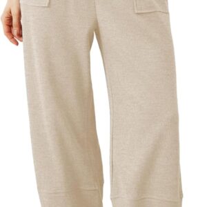 A woman wearing comfortable and stylish high-waisted baggy wide leg pants, a versatile fashion staple.