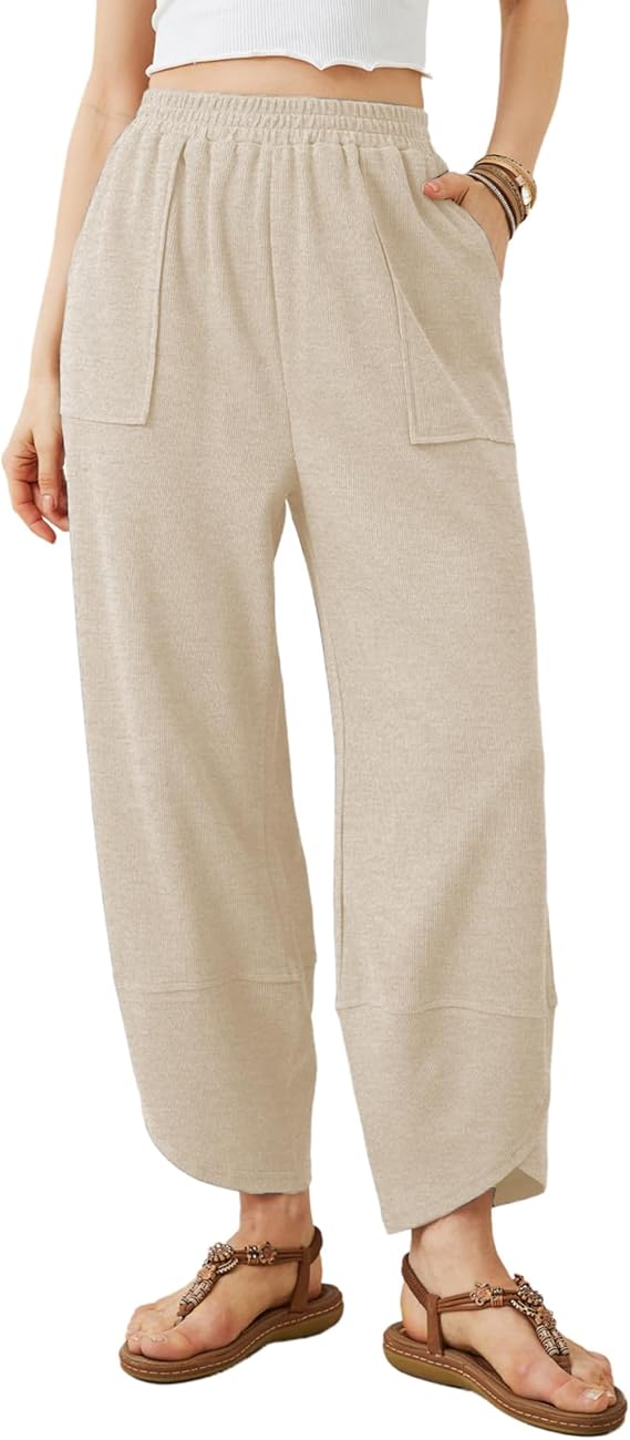 A woman wearing comfortable and stylish high-waisted baggy wide leg pants, a versatile fashion staple.